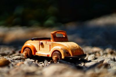 Close-up of abandoned toy car