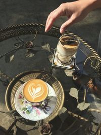 High angle view of coffee cup on table