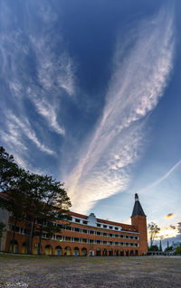 Exterior of building against sky during sunset