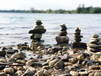 Close-up of stones at lake