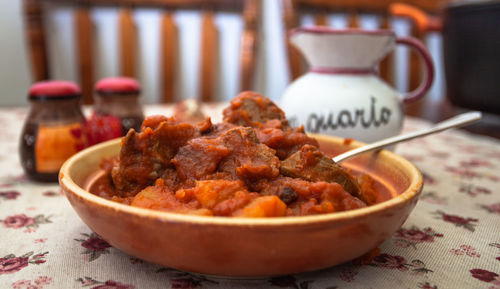 Close-up of meat in bowl on table