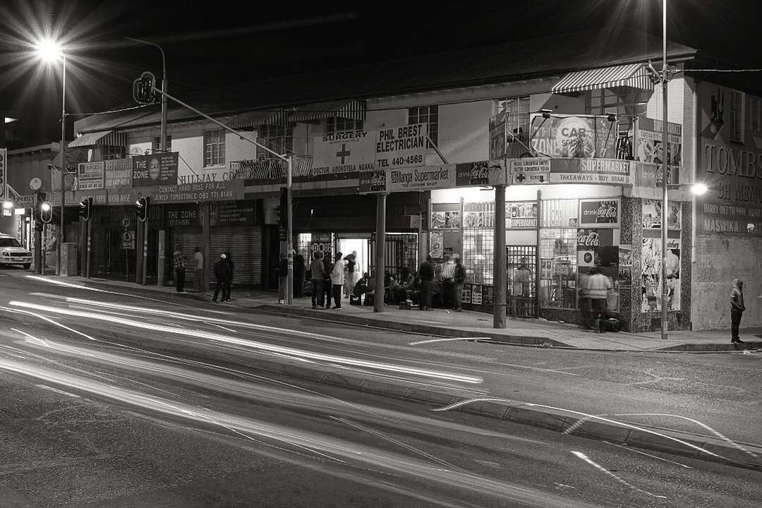 CITY STREET AT NIGHT