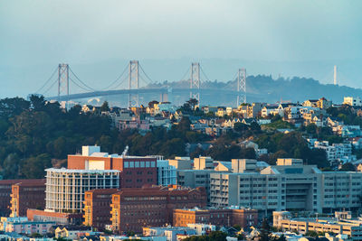 View of buildings in city against sky