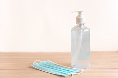 Close-up of water bottle on table