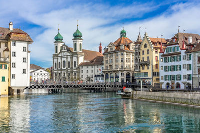 View of historical buildings against sky in city