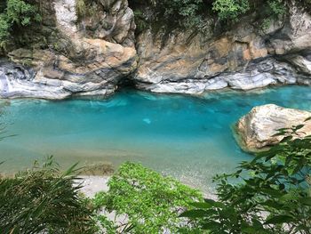 High angle view of lake amidst trees