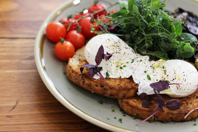 Close-up of breakfast served in plate