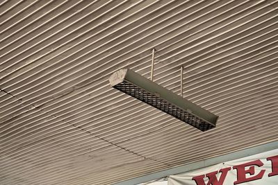 Low angle view of text on wall