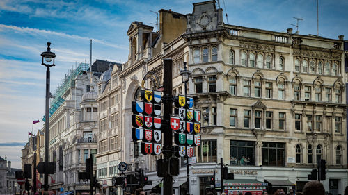 Street by building against sky