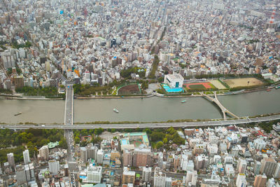 High angle view of river amidst city