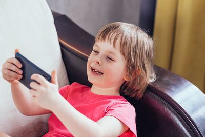 Young woman using mobile phone