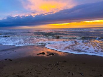 Scenic view of sea against sky during sunset