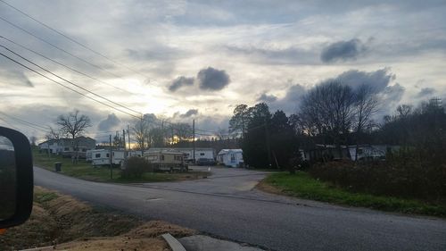 Road against cloudy sky
