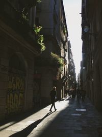 Man walking on street in city