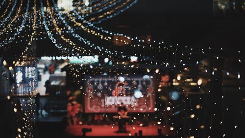 Close-up of illuminated lights at night