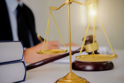 Close-up of yellow weight scale on table