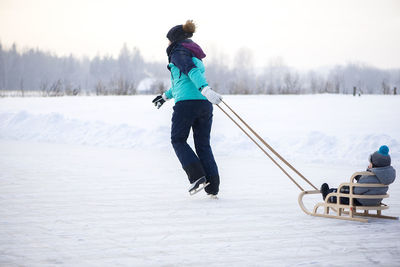 Full length of man on snowy field