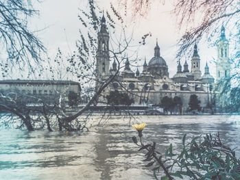 View of a river with buildings in background