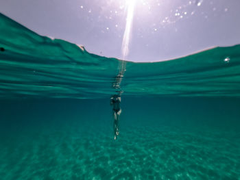 Man swimming in sea