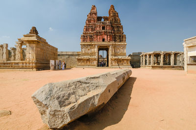 Old temple building against sky