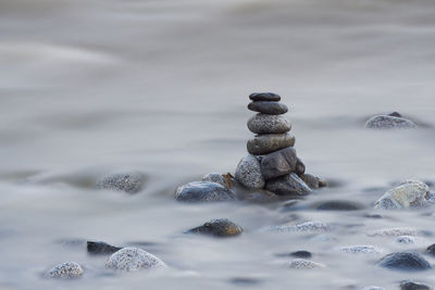 Stack of pebbles in water