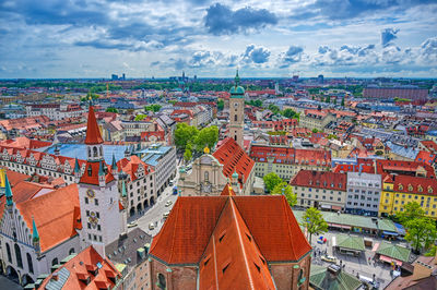 High angle view of townscape against cloudy sky