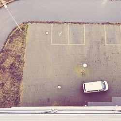 High angle view of road sign on street