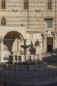 Fountain in old building in city