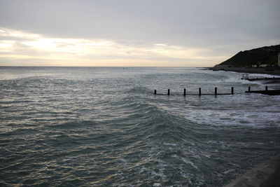 Scenic view of sea against sky during sunset