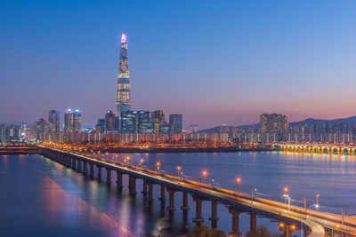 View of illuminated city at night