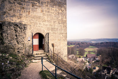 Old castle building against sky