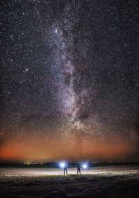 Scenic view of star field against sky at night