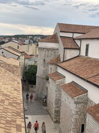 High angle view of buildings in city against sky