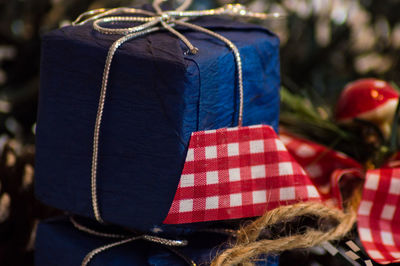 Close-up of flag against blue wall