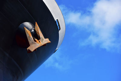 Low angle view of airplane against sky