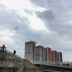 Low angle view of buildings against sky in city