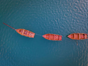 High angle view of red floating on sea