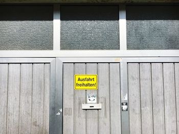 Information sign on wall of garage