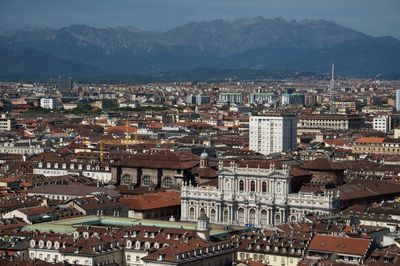 High angle view of townscape against mountains