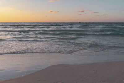 Scenic view of sea against sky during sunset