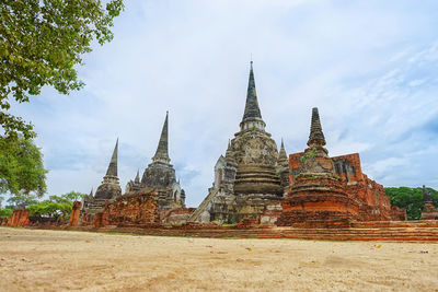 Old temple against building