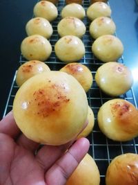 Close-up of hand holding fruits