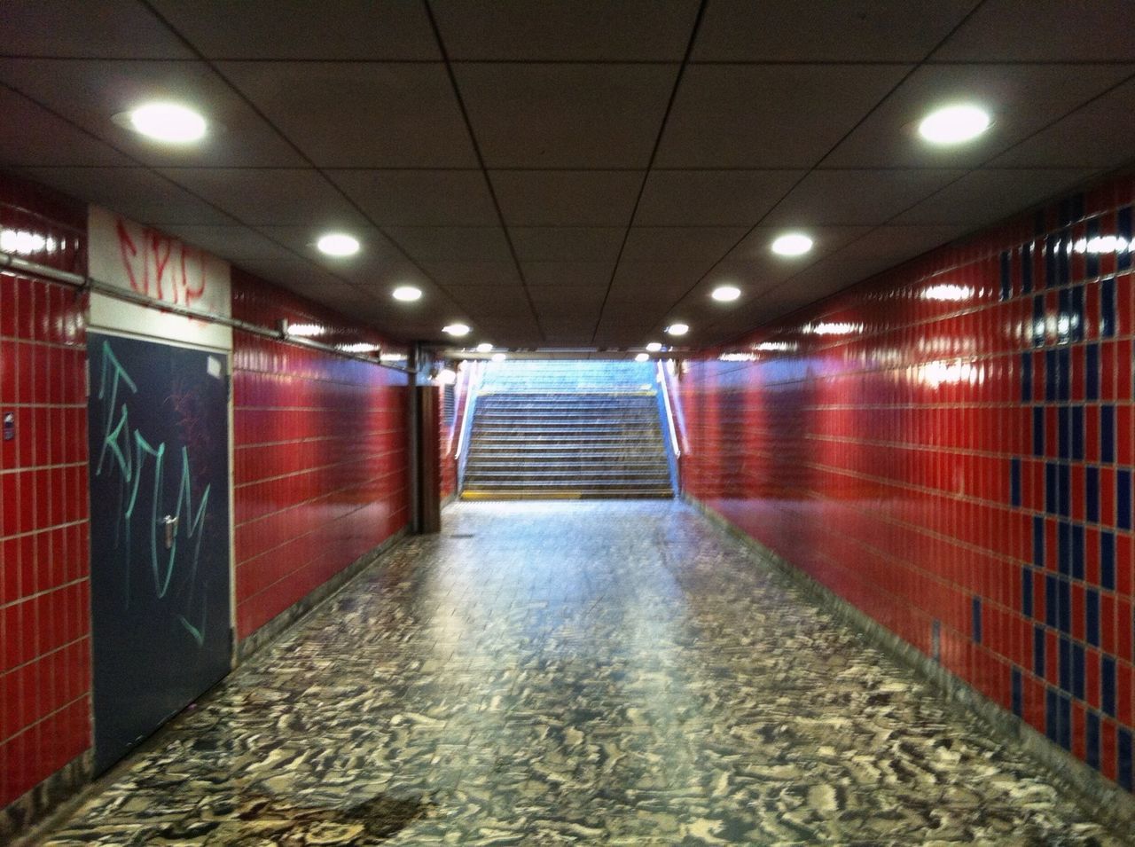 VIEW OF EMPTY UNDERGROUND WALKWAY