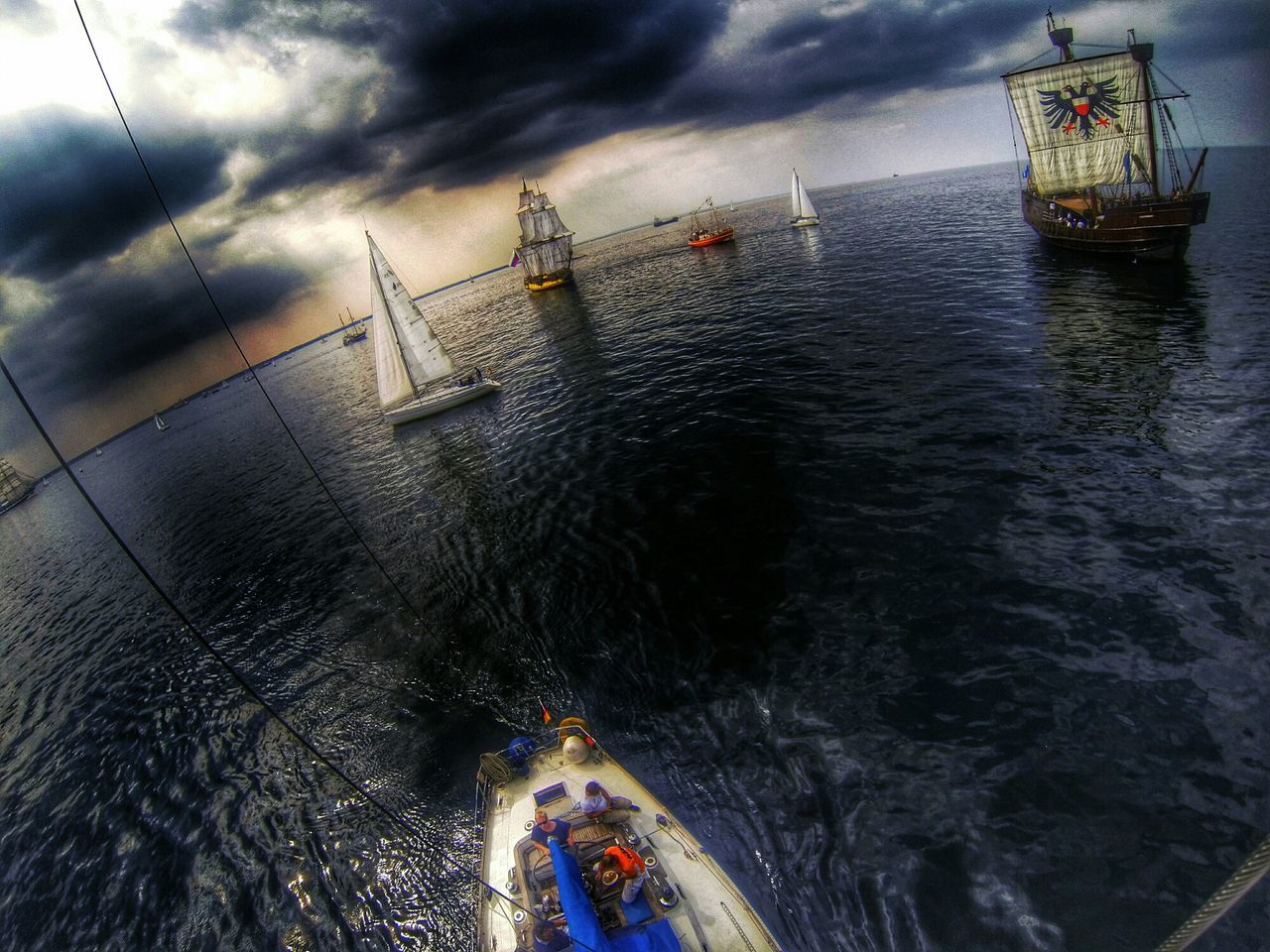 transportation, nautical vessel, water, mode of transport, sky, cloud - sky, boat, sea, cloudy, moored, harbor, waterfront, mast, travel, ship, cloud, weather, nature, dusk, outdoors