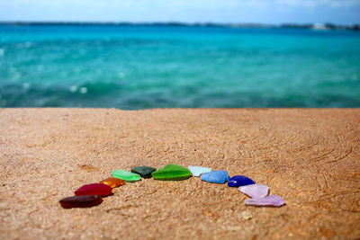 Multi colored umbrellas on beach