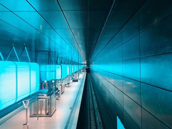 Interior of illuminated subway station