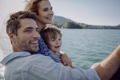 Happy family on a sailing trip