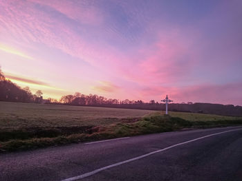 Empty road at sunset