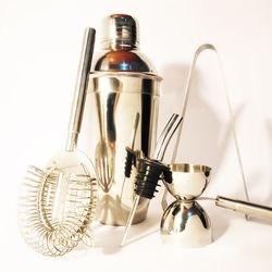 Close-up of utensils on white background