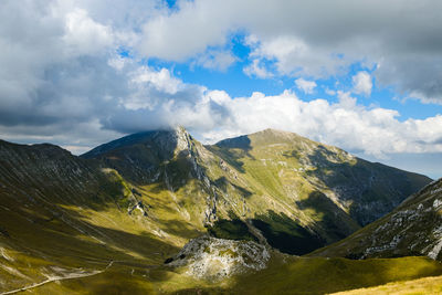 Scenic view of mountains against sky in frontignano, marche italy